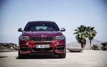 Анфас BMW X6 M50d, БМВ Х6, передок, фото нового БМВ 2015, пальмы, небо, фары, решетка