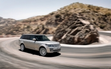 Range Rover на извилистой трассе, повороты, камни, скалы