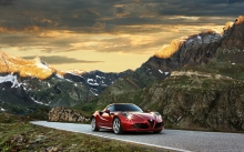 Красный Alfa Romeo 4C на фоне гор, снежные вершины, природа, пейзаж, скалы